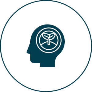 Dark teal icon of a human head with a brain inside.